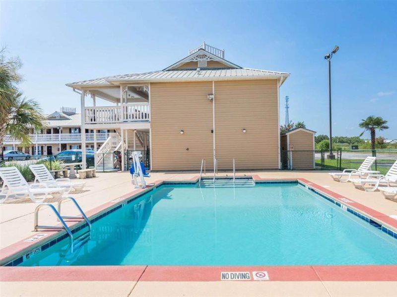 Motel Super 8 By Wyndham Foley Exterior foto