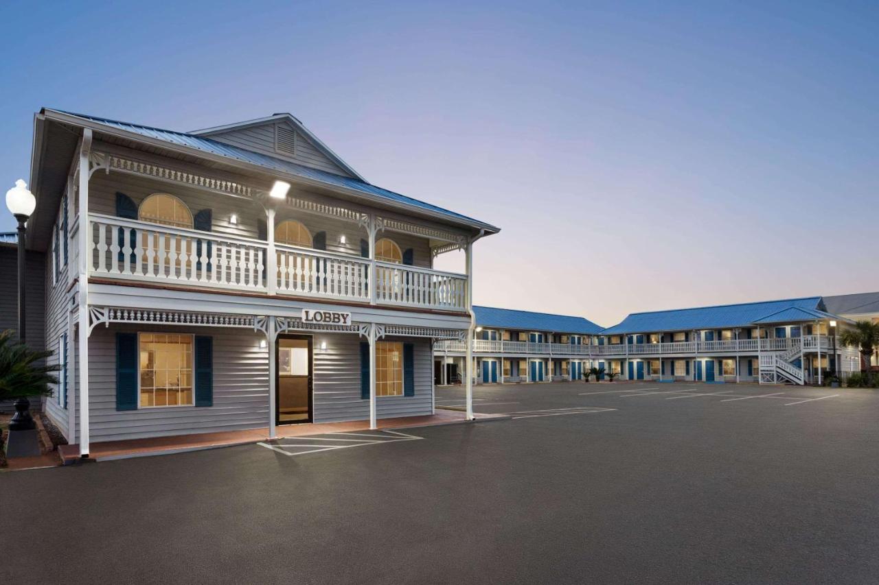 Motel Super 8 By Wyndham Foley Exterior foto