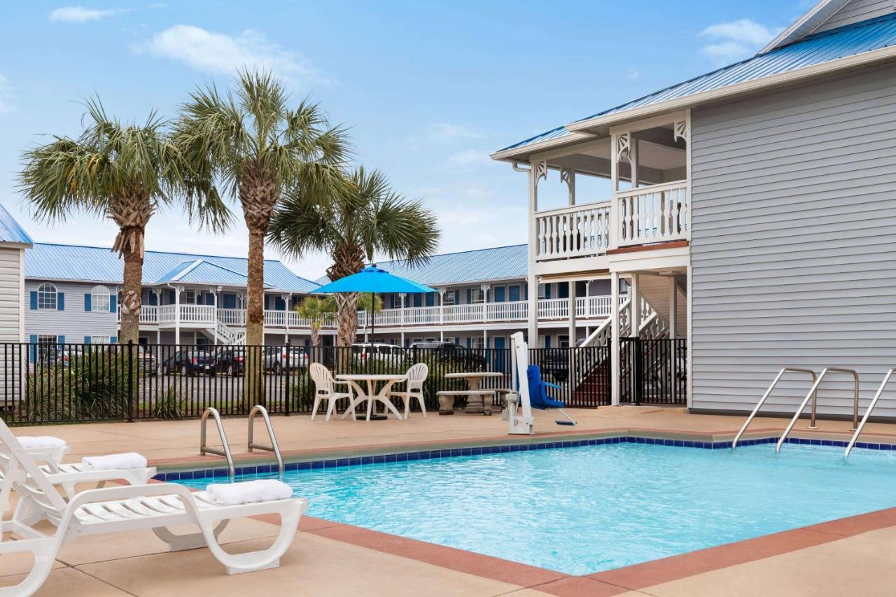 Motel Super 8 By Wyndham Foley Exterior foto